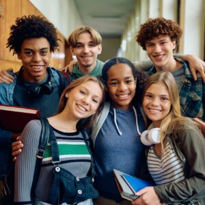 Portrait of happy high school students looking at camera.
